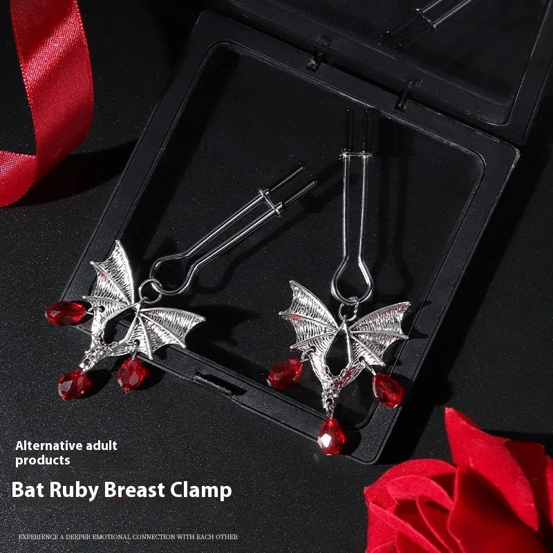 Silver bat nipple clamp with ruby design and adjustable spring mechanism