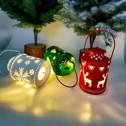 Green wrought iron electronic candle lantern with flickering LED light on a wooden mantel.