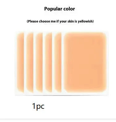 Tattoo cover patch and a 130mm long concealer brush on a table, with colour option swatches visible.