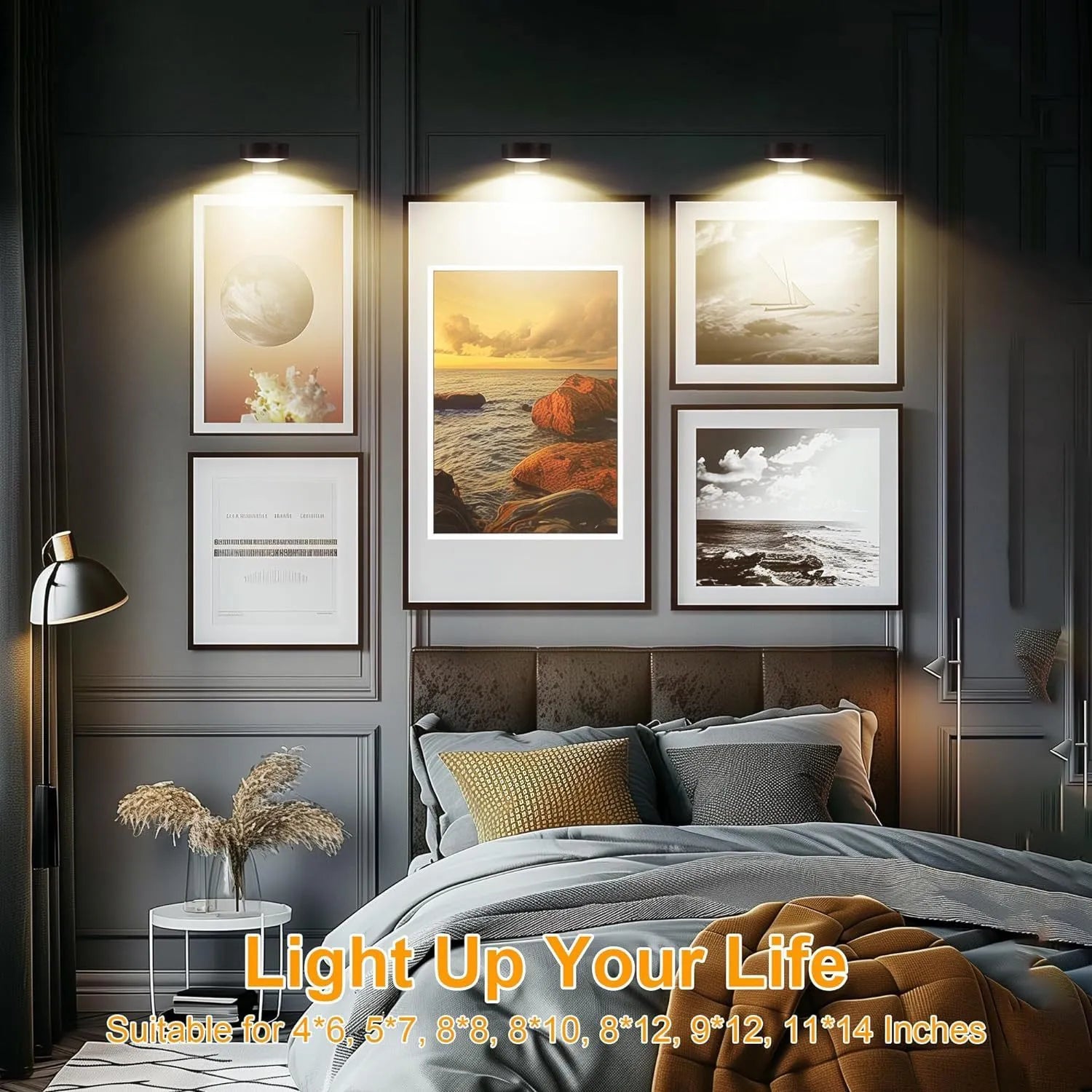 Black magnetic LED painting lamp with remote control on a white wall.