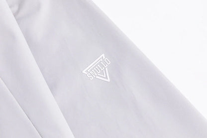 Military Green Assault Suit for outdoor adventures, durable and comfortable with multiple pockets.