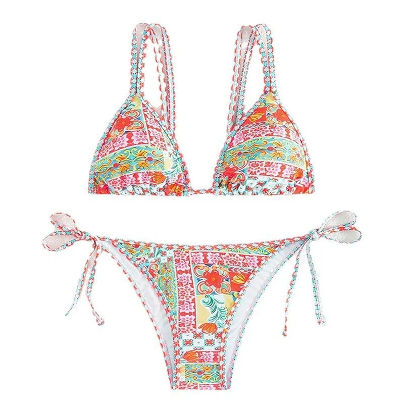 Women's lace-up front split design swimsuit bikini set in polyester with spandex lining.