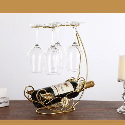 Iron wire wine rack holding four wine glasses, European style, bronze or gold finish.