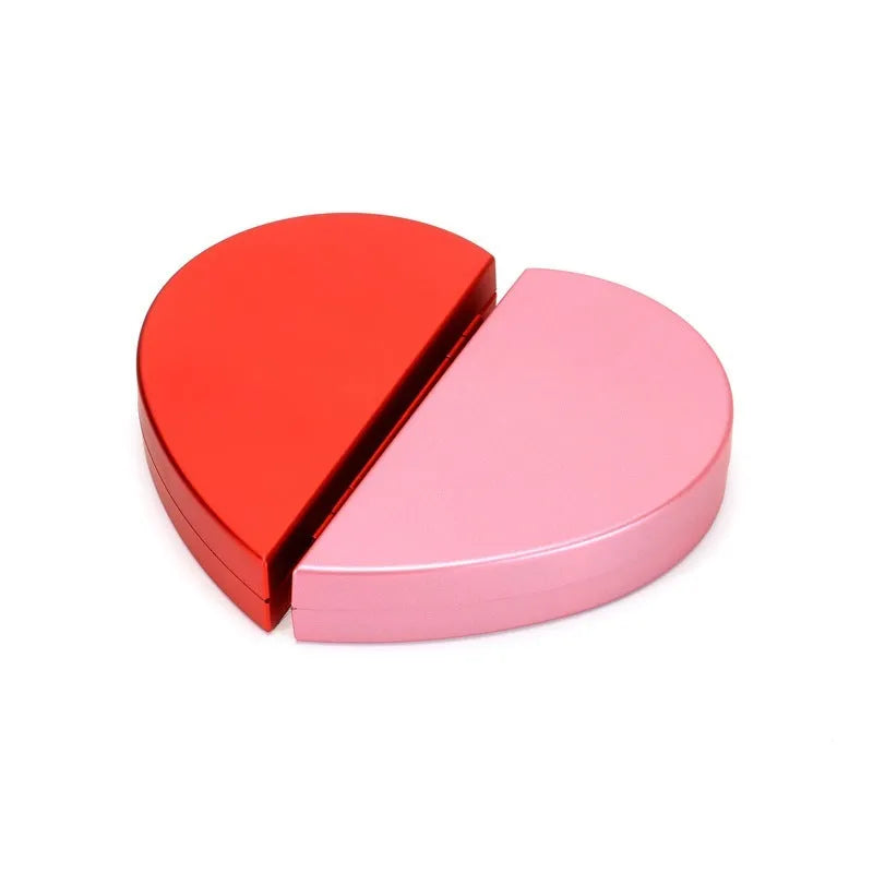 Red 3D heart-shaped plastic ring box with rose decoration on a rotating stand