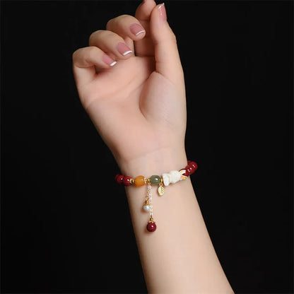 Natural cinnabar rabbit bracelet in beeswax purple and gold sand, national style, shown in 8mm and 10mm sizes.