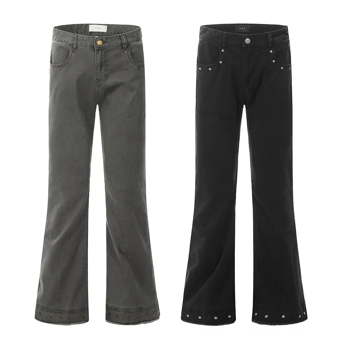 Pair of black straight-leg skinny jeans with a mid-rise waist and zipper fly on a neutral background.