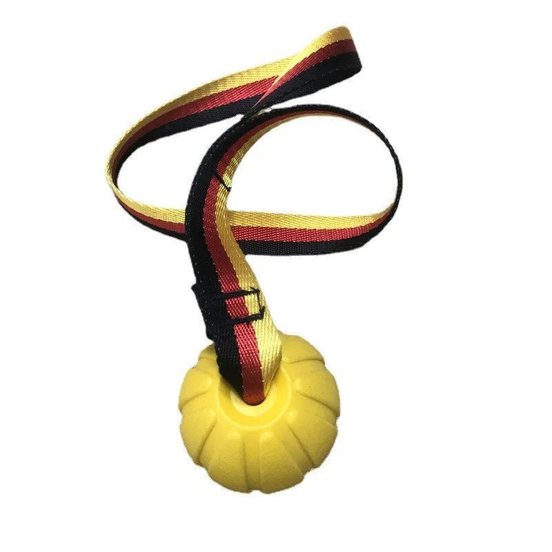 Camouflage and yellow EVA foam floating dog ball with knotted tetherball design.