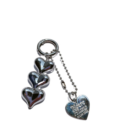 Acrylic key ring with an electroplated decorative charm in a choice of heart, bell, or water drop shapes.