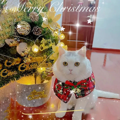 Pet wearing Christmas scarf with snowflake pattern, showing adjustable fit and holiday design details