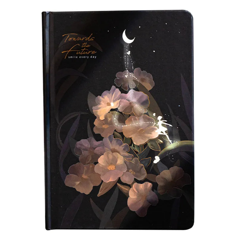 A5 notebook with luminous cover in Deep Blue, open to show 100 gsm paper and colour illustrations