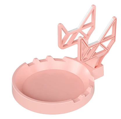 Black ABS plastic wall hanging rack with an X-shaped handle, shown with adhesive gel and screws for mounting.