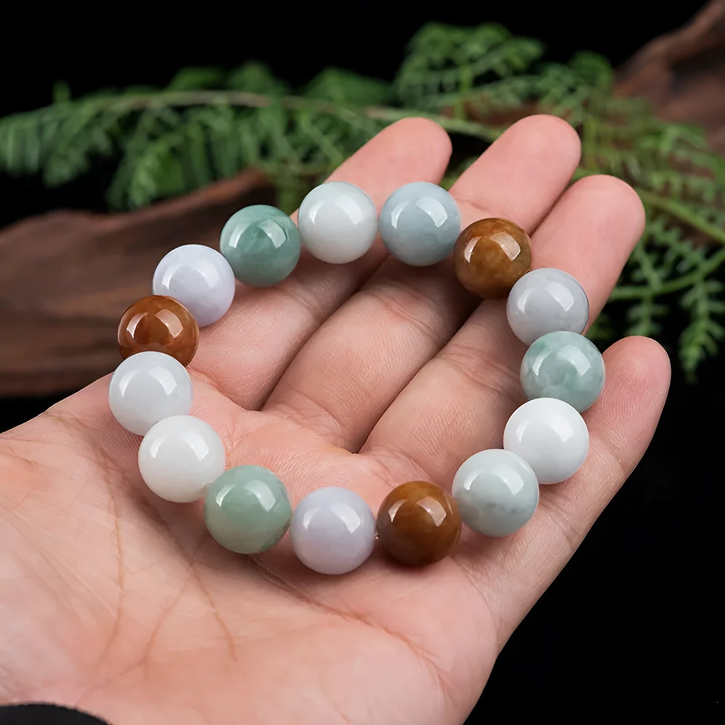 Women's natural jade bracelet with 13mm round beads showing three colours, national style design.