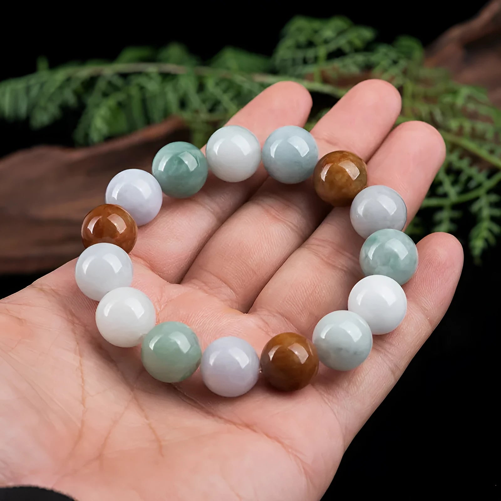 Women's natural jade bracelet with 13mm round beads showing three colours, national style design.