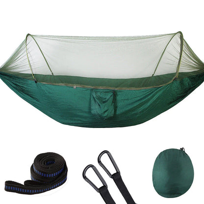 Cozy outdoor hammock with mosquito net for relaxing in nature and outdoor adventures