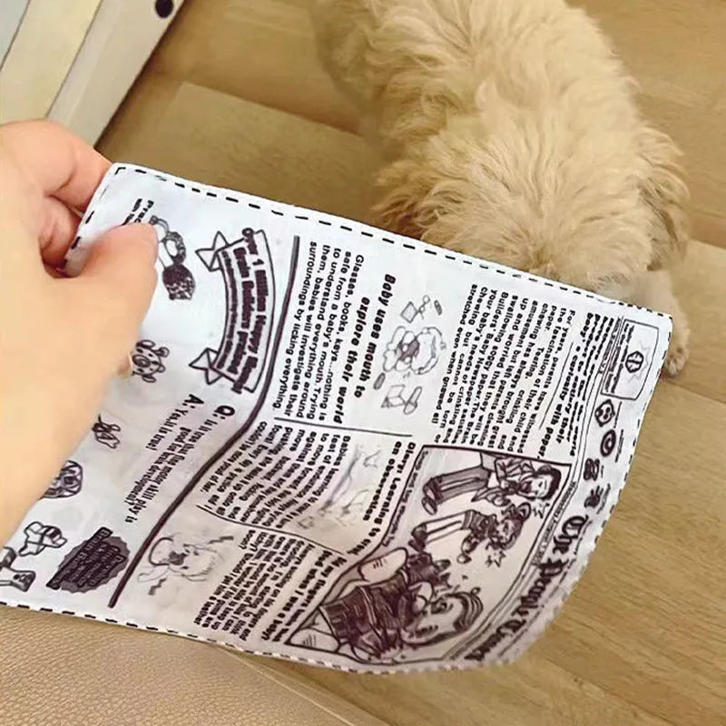Tearproof squeaking dog toy with printed newspaper and playing card designs
