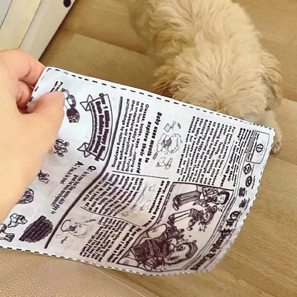 Tearproof squeaking dog toy with printed newspaper and playing card designs