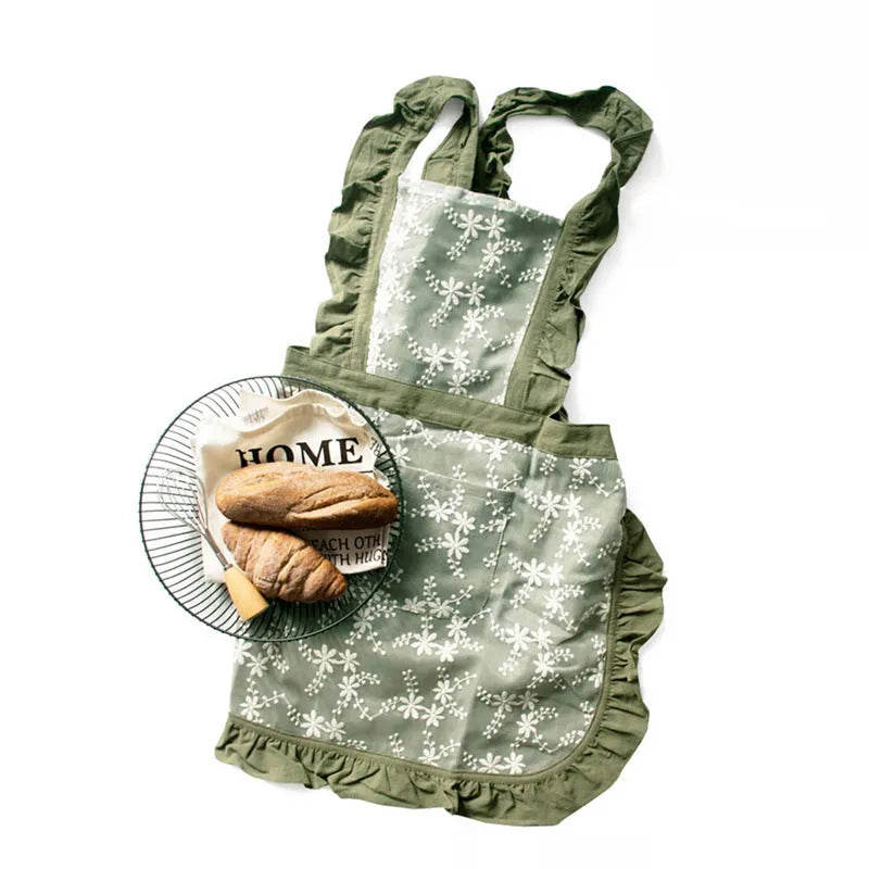 Kitchen apron with cotton linen blend fabric and cross-back X-strap design in free size, featuring solid colours and minimalist style for cooking or baking with lace trim detailing and 66cm width by 72cm length dimensions.