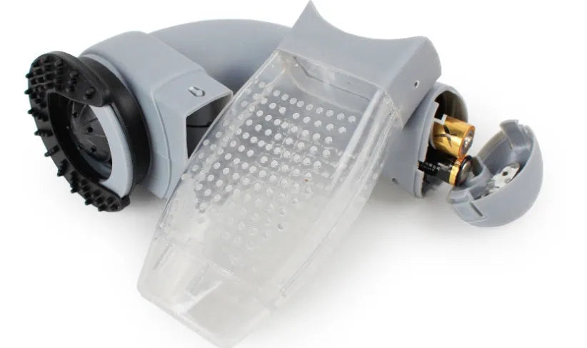Grey portable pet hair vacuum cleaner with soft rubber head for grooming cats and dogs.