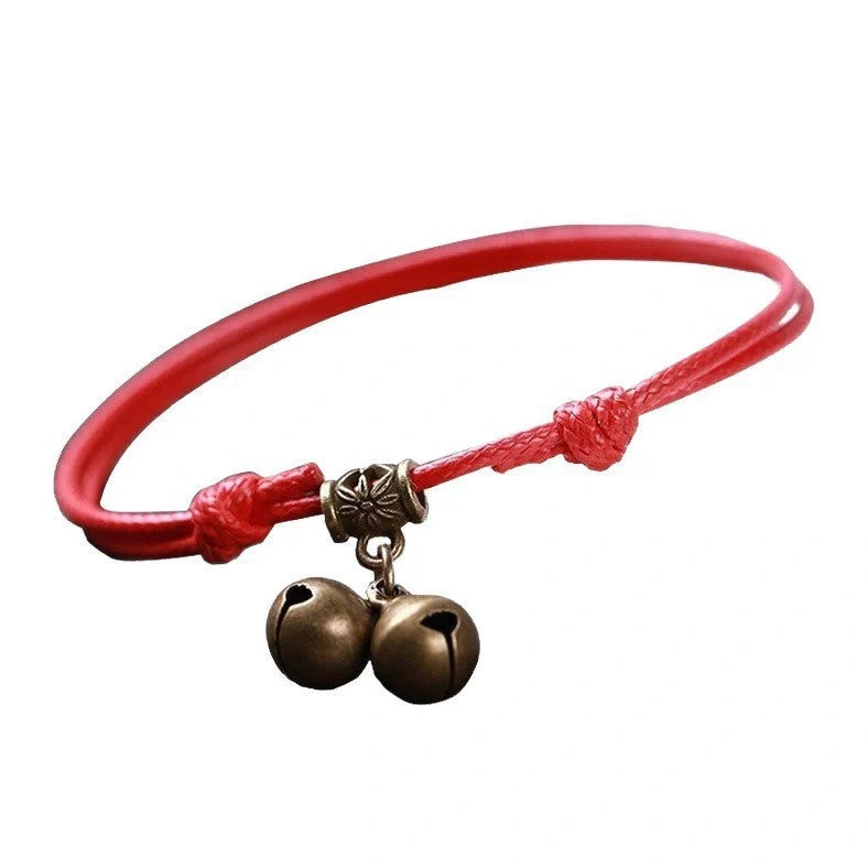 Adjustable nylon rope dog collar with brass bell in black, red, and coffee colour options