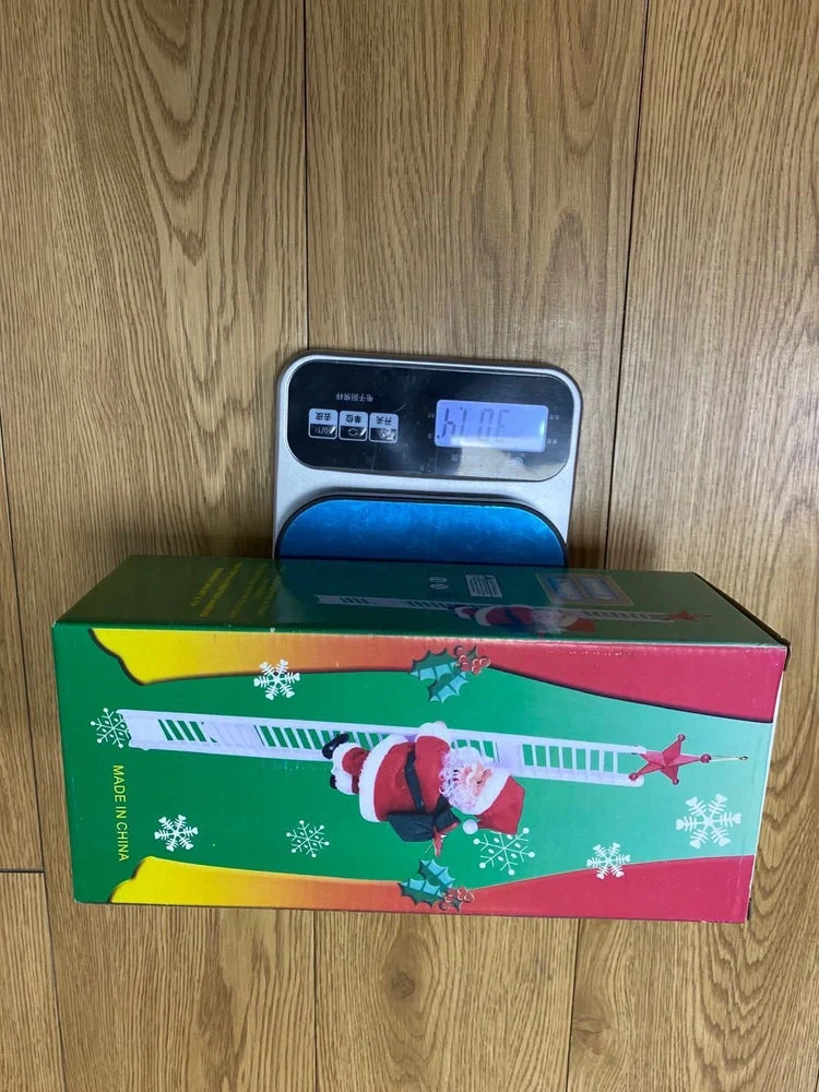 Electric Santa Claus climbing ladder decoration measuring 20cm tall with continuous motion mechanism