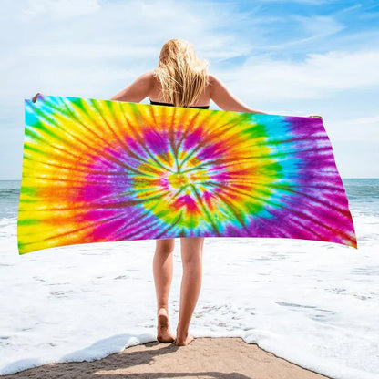 Square beach towel with tie-dye pattern showing superfine fibre texture and vibrant colours
