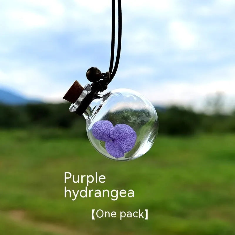 Glass fire extinguisher-shaped car perfume pendant with preserved flowers inside