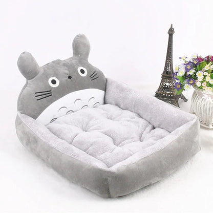 Cartoon-style soft pet bed sofa for small dogs and cats with a washable cover