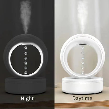 White round USB-powered anti-gravity humidifier creating optical illusion of levitating water droplets