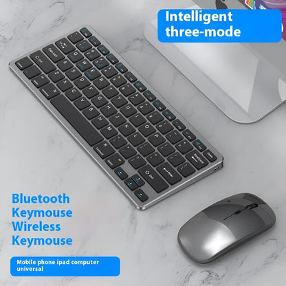 Black ultra-thin wireless keyboard and mouse combo with USB receiver and keyboard cover on a desk.
