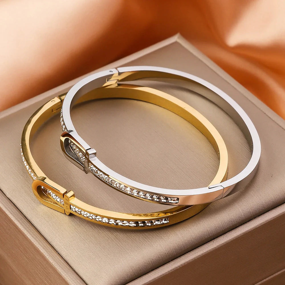 Exquisite gold-plated stainless steel bracelet with a unique and eye-catching design, perfect for adding a touch of elegance to any outfit.
