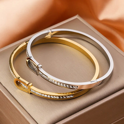 Exquisite gold-plated stainless steel bracelet with a unique and eye-catching design, perfect for adding a touch of elegance to any outfit.