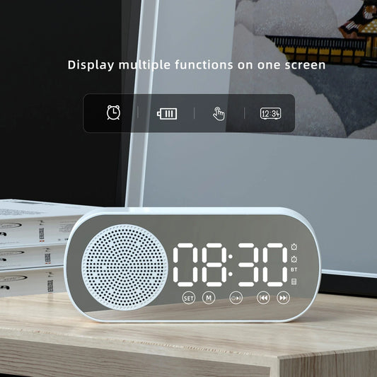 5-in-1 Bluetooth alarm clock with mirror design, LED display, FM radio, dual alarms, and phone stand