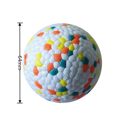 Interactive chew toy ball for dogs, featuring a durable TPU construction and corn grain design to clean teeth while playing