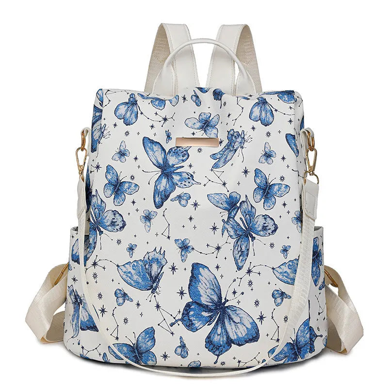Butterfly printed large capacity PU backpack in various colours with sewing line details and an ergonomic back.