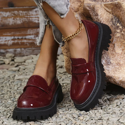 Plus size slip-on loafers with chunky platform heel in black, wine red, or green, showing rubber sole and middle top design.