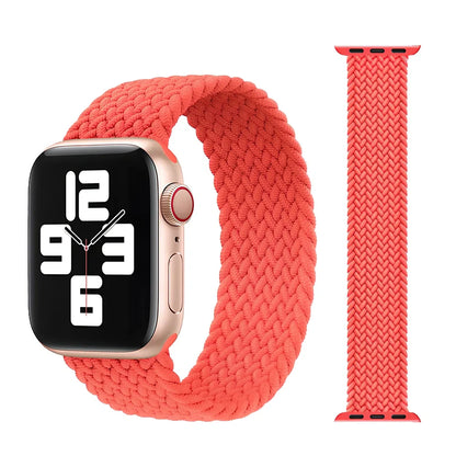 Apple Watch with elastic braided nylon strap in single-loop design showing stretch capability