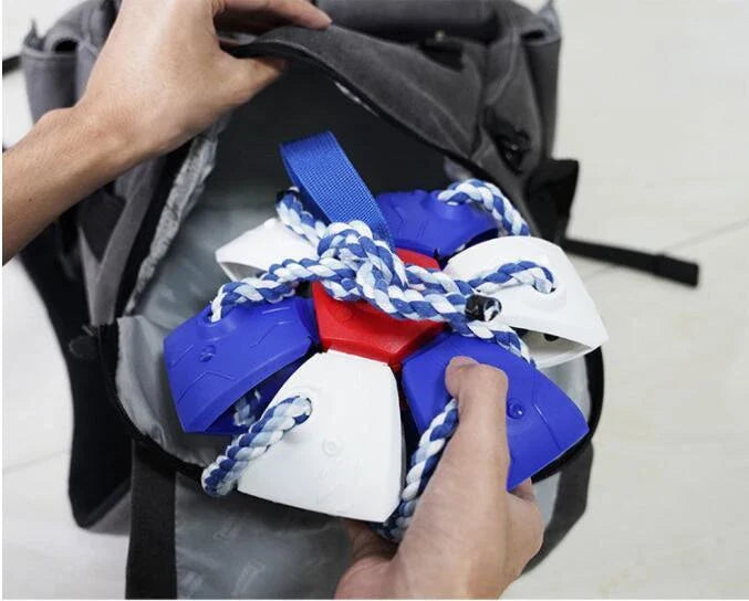 Transforming dog toy that can switch between a ball and frisbee shape, featuring durable construction and interactive play features