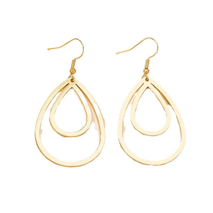 Golden yellow hollow drop earrings made from iron, shown as a single pair for everyday fashion.