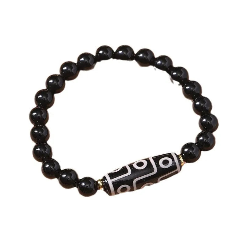 Obsidian agate dzi bead Tibetan bracelet with ethnic pattern on wrist