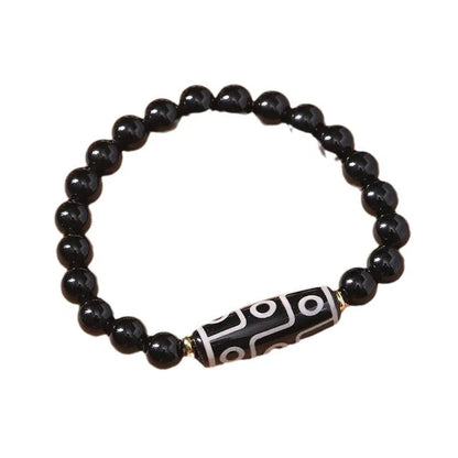 Obsidian agate dzi bead Tibetan bracelet with ethnic pattern on wrist