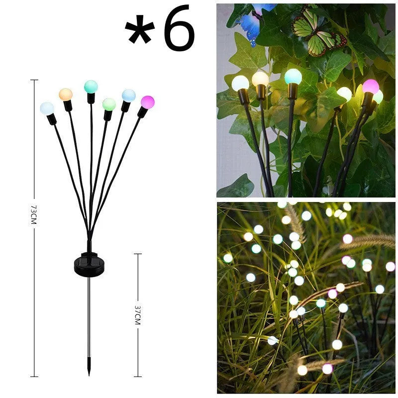 Solar-powered ground plug lawn light with automatic dusk-to-dawn operation and multiple head configurations
