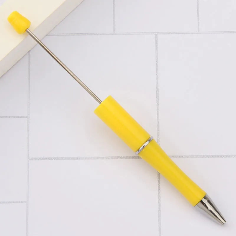 Rotating bead ballpoint pen in gradient colour with ABS plastic and steel wire construction
