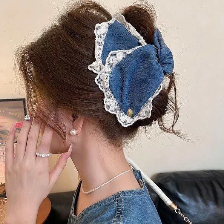 Handmade fabric bow hair grip with triangle grip design and plastic hairpin