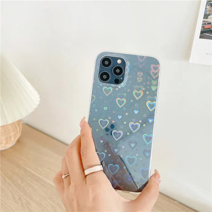 Laser colourful love silicone phone case with transparent colour and laser-etched motifs, shown on an iPhone.
