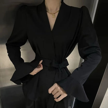 Women's French-style irregular collar long sleeve tied shirt in black with bell sleeves and tied front