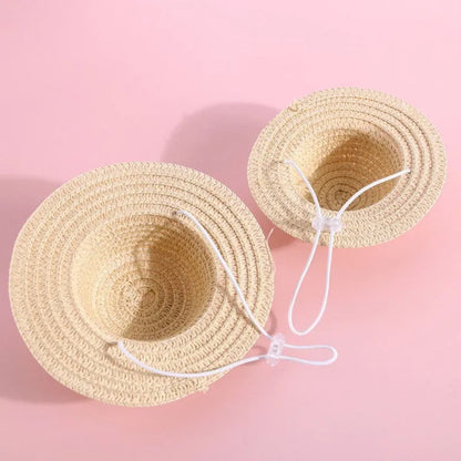Handmade adjustable bowknot paper hat for a dog or cat, shown in a cartoon style with an elastic fastening loop.