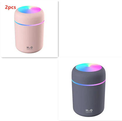 Compact and Quiet Bedroom Mist Humidifier with Soothing Mood Lighting in White, Navy Blue, and Pink Colors