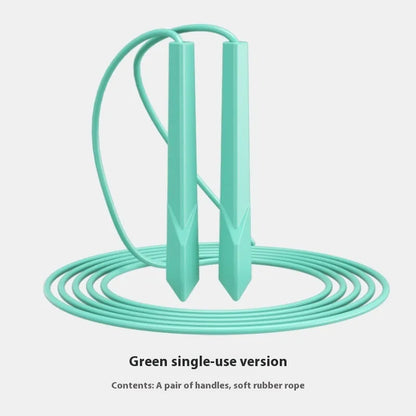 Blue PVC skipping rope with plastic handles on a grey background.