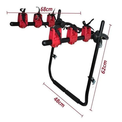Black and red trunk mounted car bike holder rack with adjustable fastening system on vehicle boot