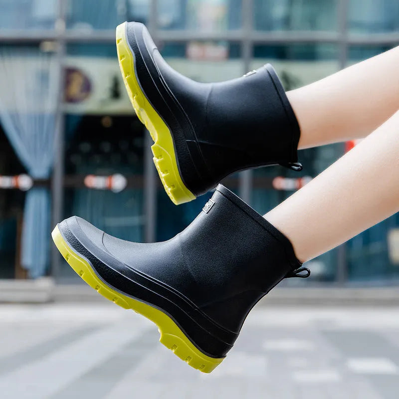 Women's low-cut white waterproof plastic shoes with a non-slip rubber sole on a plain background.